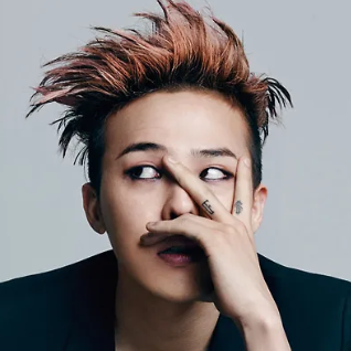 G-Dragon Best Hits playlist cover — bold graphic portrait
